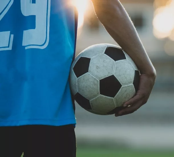 football player walking onto pitch