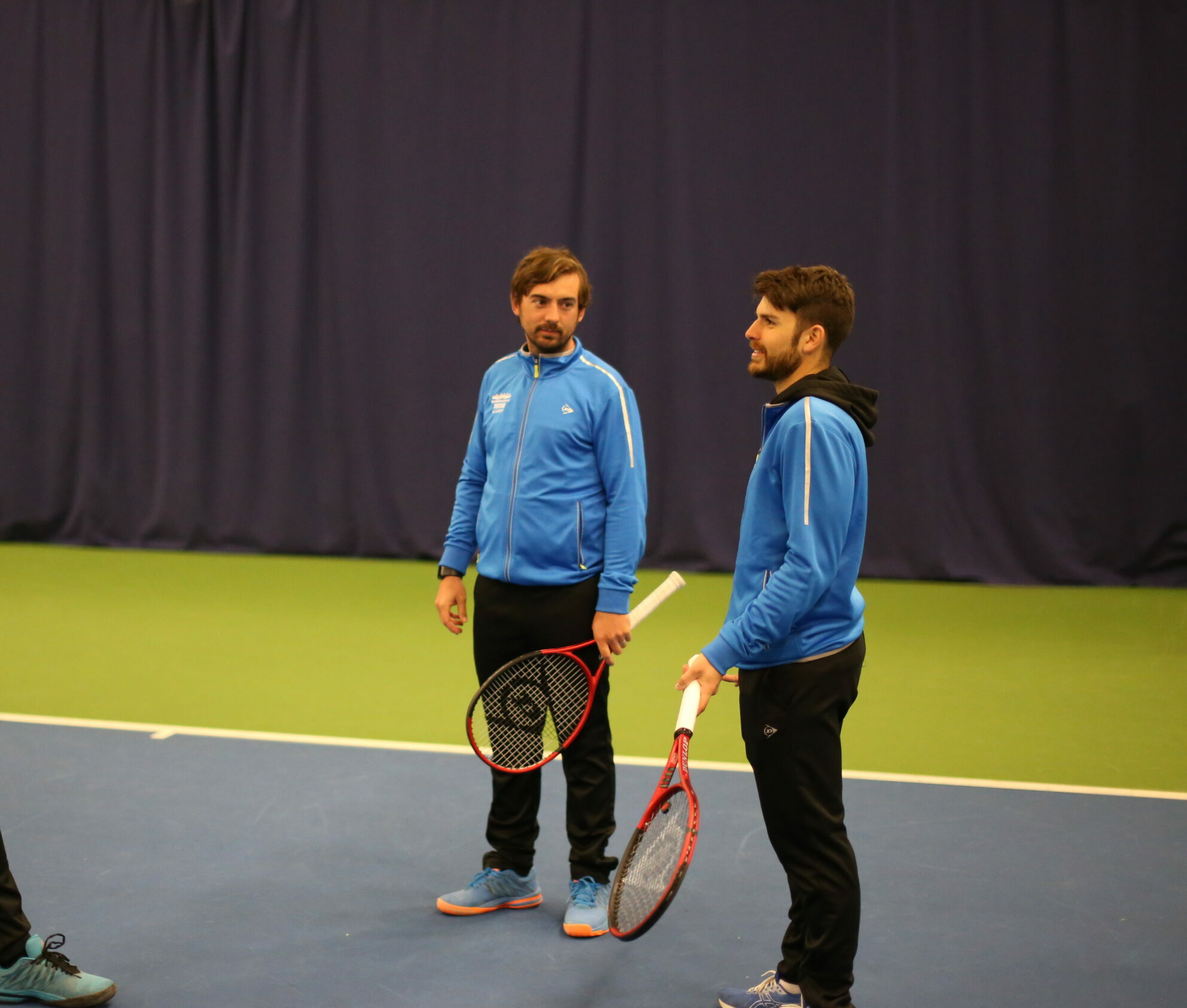 Tennis coaching of two tenns